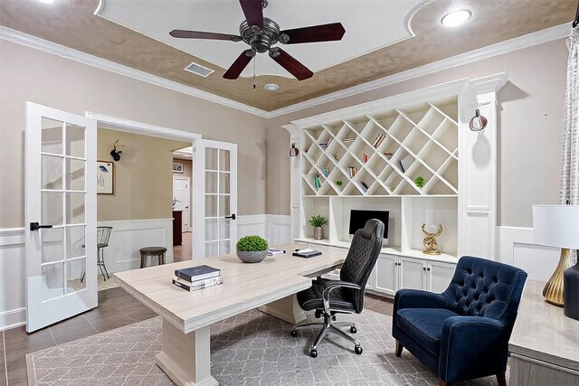 14124 Rodeo Daze Dr, Fort Worth, TX 76052 - office area featuring a ceiling fan, french doors, visible vents, a wainscoted wall, and a decorative wall