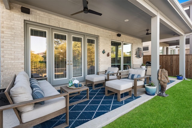 view of patio with ceiling fan, french doors, an outdoor hangout area, and fence