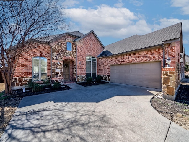 traditional-style home with stone siding, brick siding, and driveway