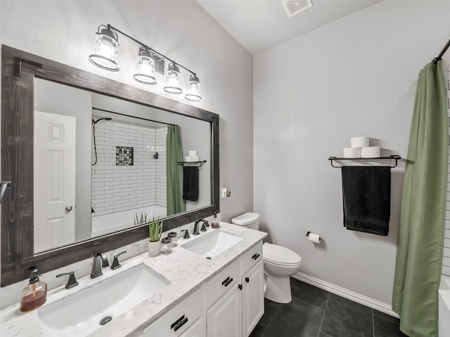 full bath featuring toilet, tile patterned flooring, visible vents, and a sink