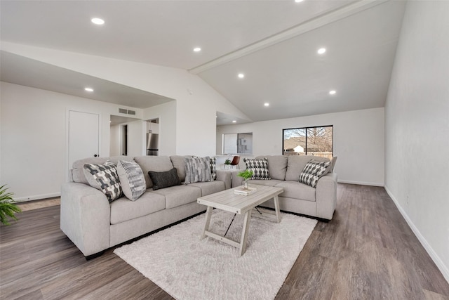 living area with visible vents, lofted ceiling with beams, baseboards, and wood finished floors