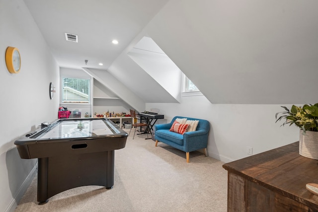 recreation room with visible vents, baseboards, light colored carpet, lofted ceiling, and recessed lighting