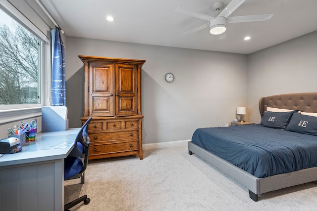 bedroom featuring baseboards, recessed lighting, a ceiling fan, and light colored carpet