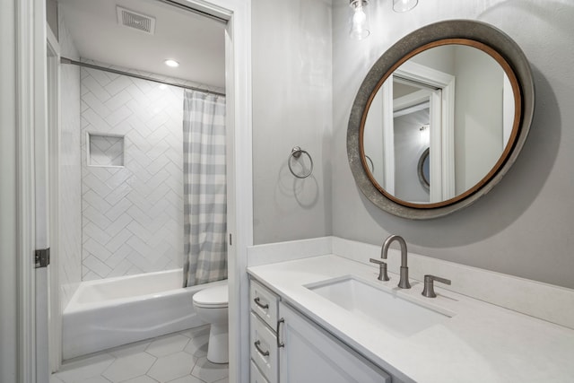 full bathroom featuring visible vents, toilet, shower / tub combo, vanity, and tile patterned flooring