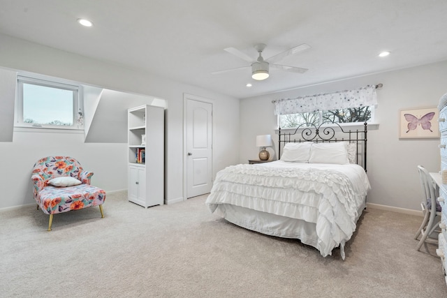 bedroom with a ceiling fan, recessed lighting, light colored carpet, and baseboards