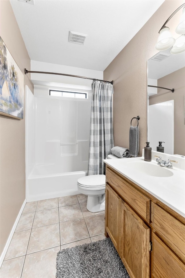 bathroom with visible vents, toilet, tile patterned flooring, shower / bath combo with shower curtain, and vanity