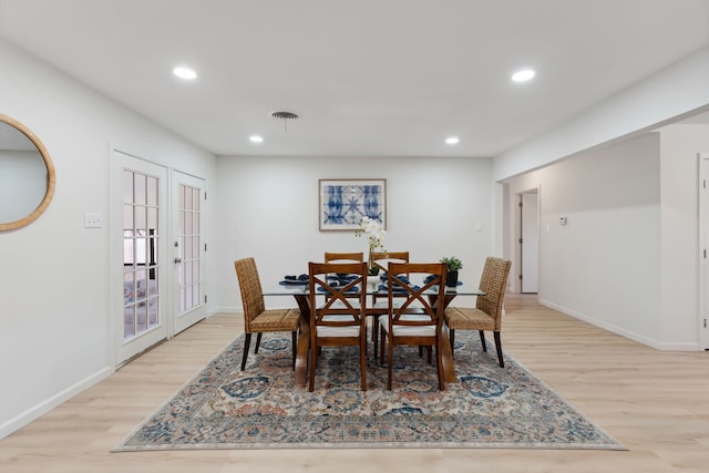 dining area featuring recessed lighting, visible vents, baseboards, french doors, and light wood finished floors