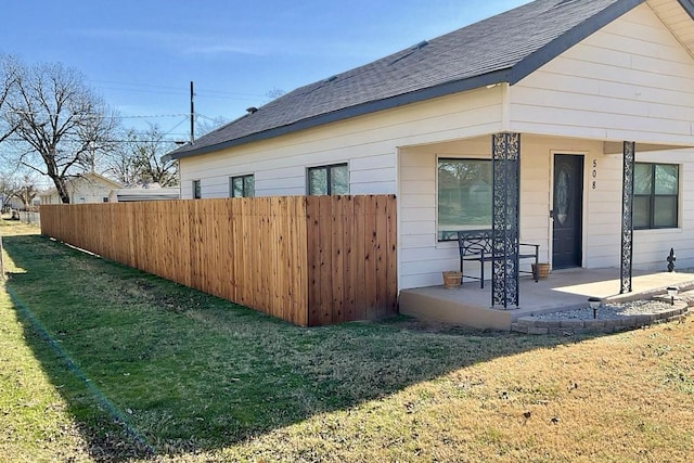 508 N Tackitt St, Seymour, TX 76380 - view of home's exterior featuring a shingled roof