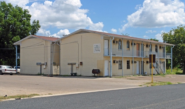 view of building exterior with stairs