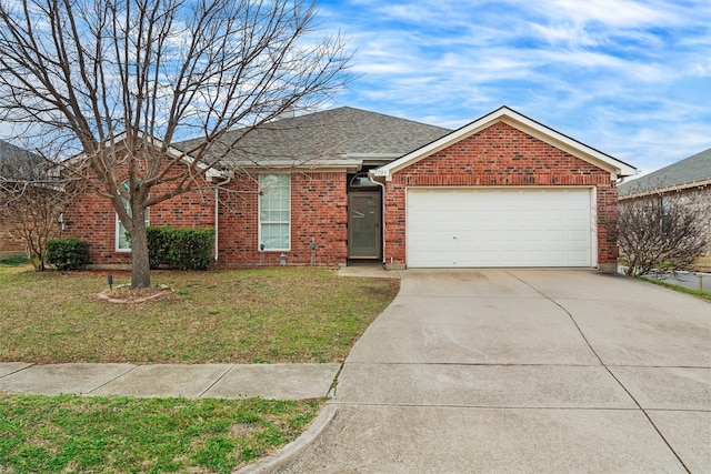 ranch-style home featuring a garage, a shingled roof, brick siding, concrete driveway, and a front lawn