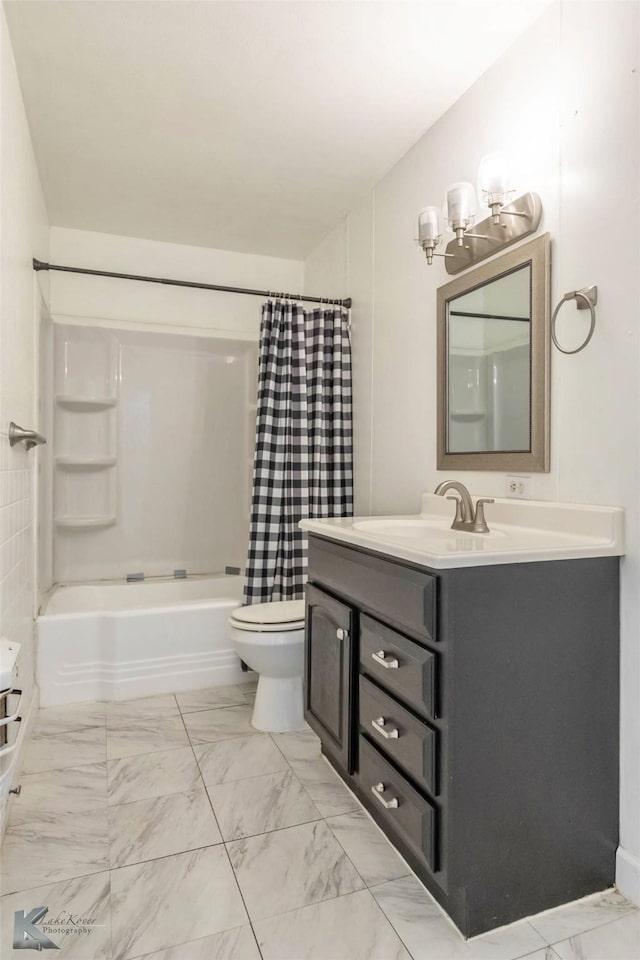 bathroom featuring toilet, marble finish floor, shower / bathtub combination with curtain, and vanity