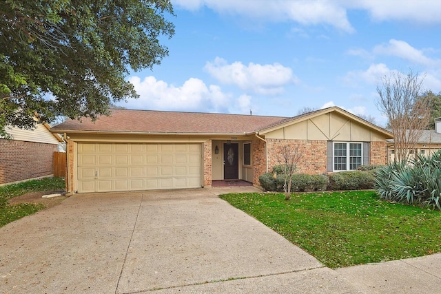 single story home featuring brick siding, an attached garage, fence, driveway, and a front lawn