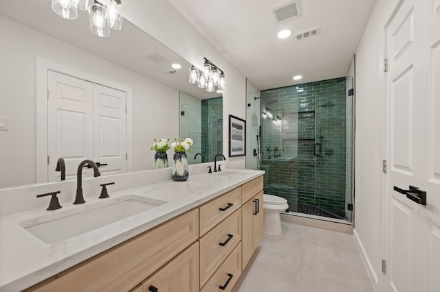 full bath with tile patterned flooring, a sink, and visible vents