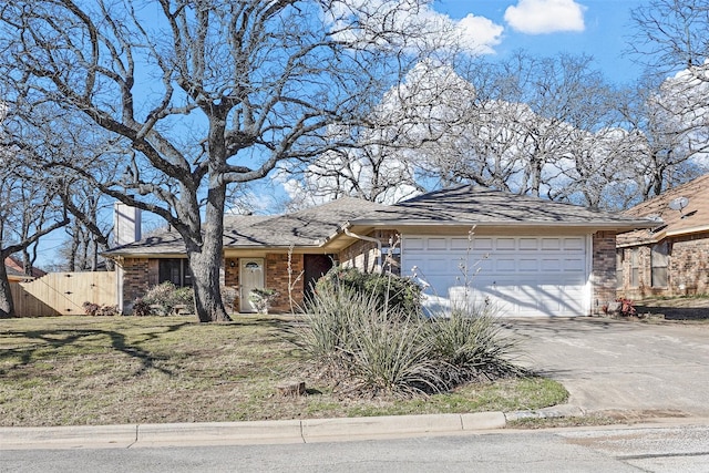 single story home featuring a garage, brick siding, fence, driveway, and a chimney