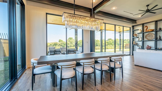 dining room featuring recessed lighting, wood finished floors, and ceiling fan with notable chandelier