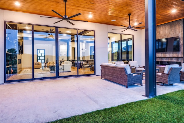 view of patio / terrace with an outdoor hangout area and a ceiling fan