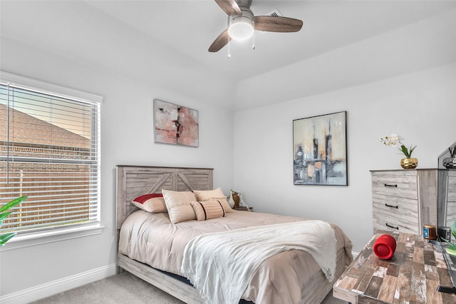 bedroom with carpet floors, baseboards, and a ceiling fan