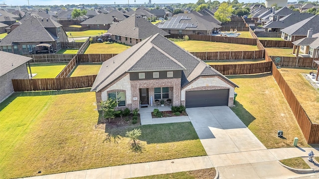 drone / aerial view featuring a residential view