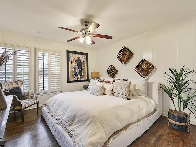 bedroom featuring ceiling fan and wood finished floors