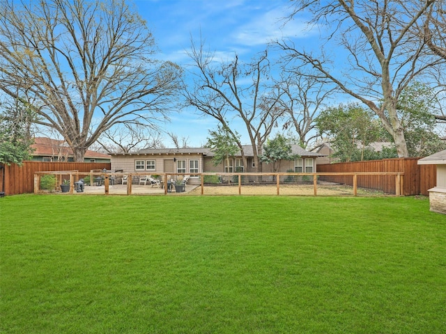 view of yard featuring a fenced backyard and a patio