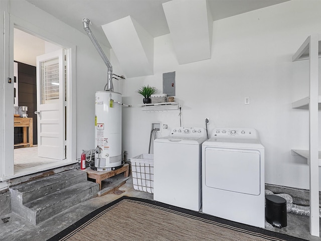 clothes washing area featuring water heater, laundry area, and separate washer and dryer