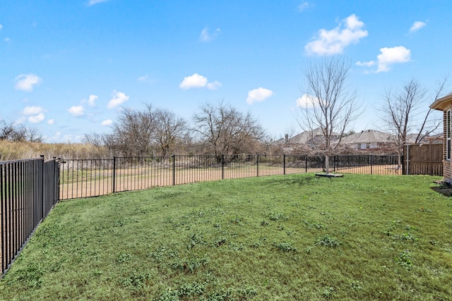 view of yard featuring fence