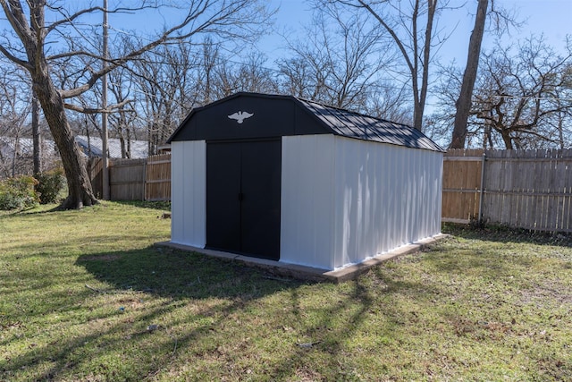 view of shed featuring a fenced backyard