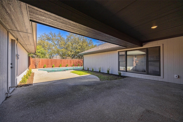 view of patio featuring a fenced backyard and a fenced in pool