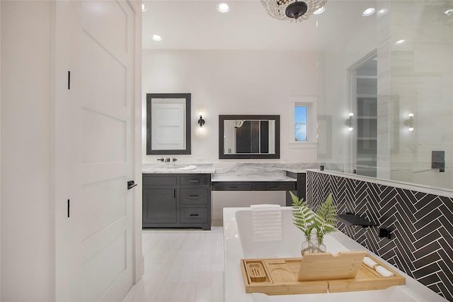 bathroom featuring vanity and recessed lighting