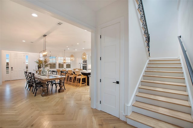 living room featuring recessed lighting and light colored carpet
