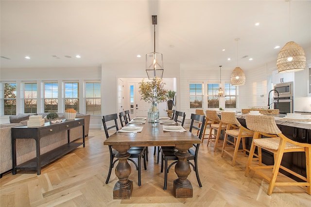 dining space featuring recessed lighting