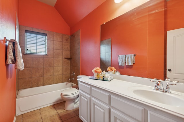 bathroom with lofted ceiling, toilet, vanity, shower / bathing tub combination, and tile patterned floors