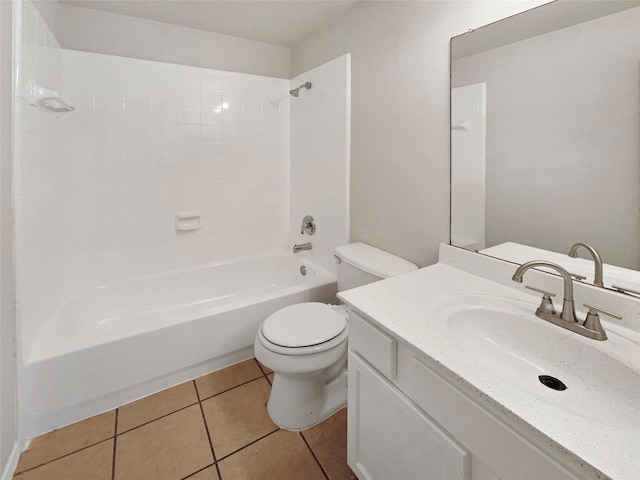 bathroom with toilet, vanity, shower / washtub combination, and tile patterned floors