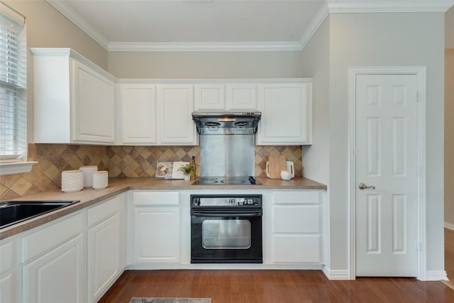 kitchen featuring dark wood-style floors, black appliances, white cabinetry, and crown molding