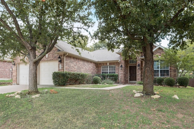 view of front of home featuring a garage, brick siding, driveway, and a front lawn