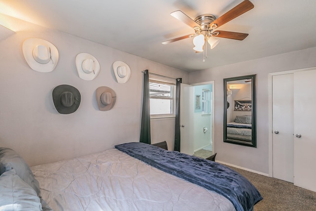 carpeted bedroom featuring ceiling fan