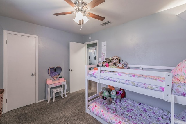 carpeted bedroom with ceiling fan and visible vents