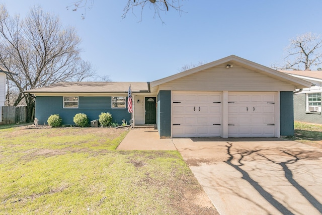 ranch-style home with a garage, concrete driveway, a front yard, and fence