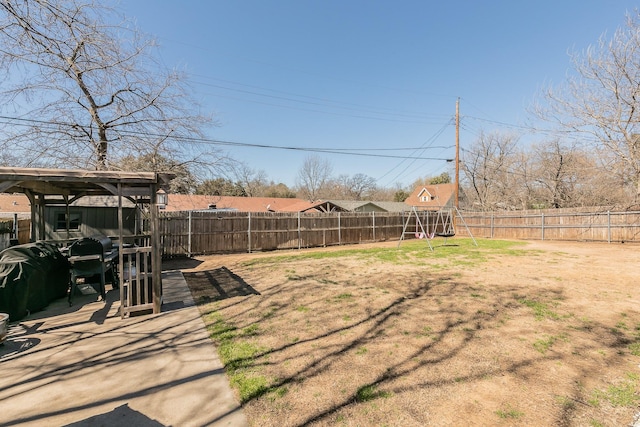 view of yard with a fenced backyard