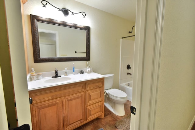 bathroom featuring tub / shower combination, vanity, toilet, and tile patterned floors