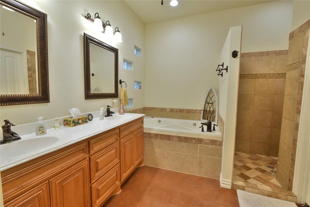 bathroom with a bath, double vanity, a walk in shower, and a sink