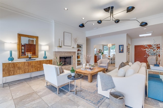 living room with a premium fireplace, recessed lighting, and crown molding