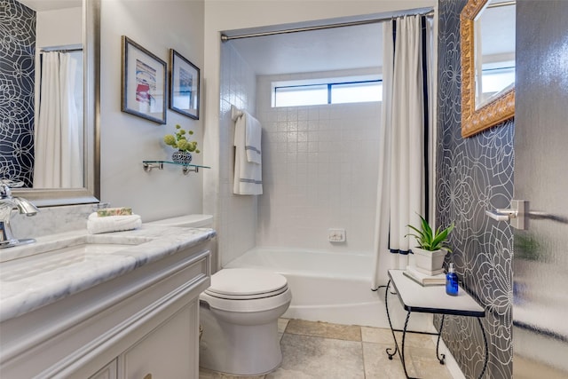 bathroom with shower / tub combo with curtain, vanity, toilet, and tile patterned floors