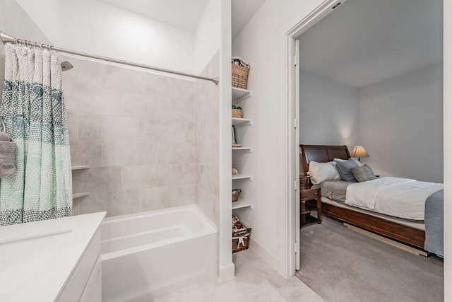 ensuite bathroom with shower / bath combo, vanity, and ensuite bath