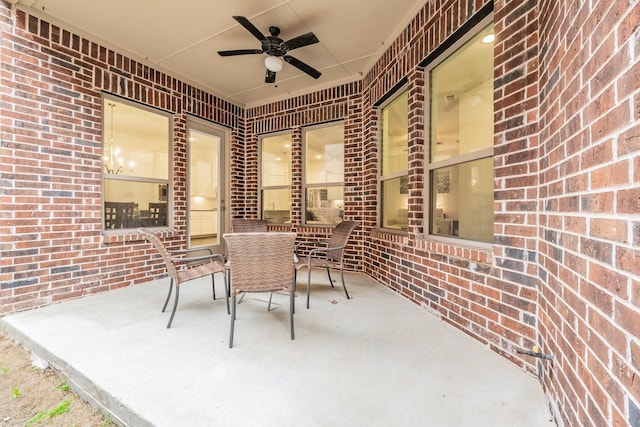 view of patio / terrace with ceiling fan and outdoor dining area