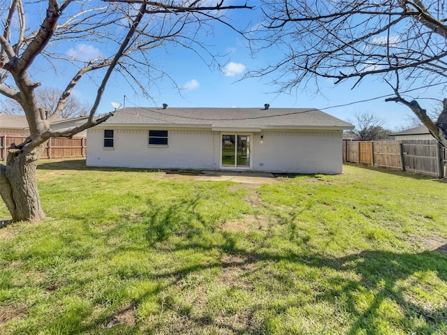 back of property featuring a patio, a lawn, and a fenced backyard