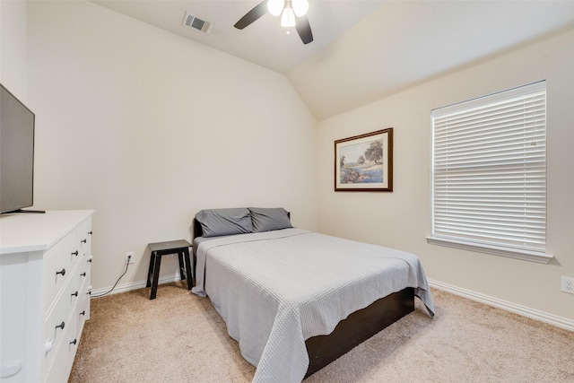 bedroom with light carpet, baseboards, visible vents, ceiling fan, and vaulted ceiling