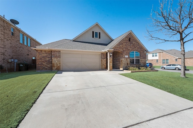 traditional-style house with brick siding, driveway, and a front lawn