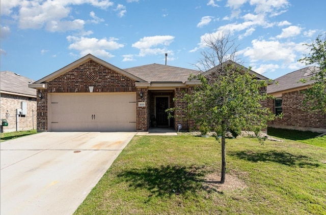 single story home with an attached garage, brick siding, a front lawn, and concrete driveway