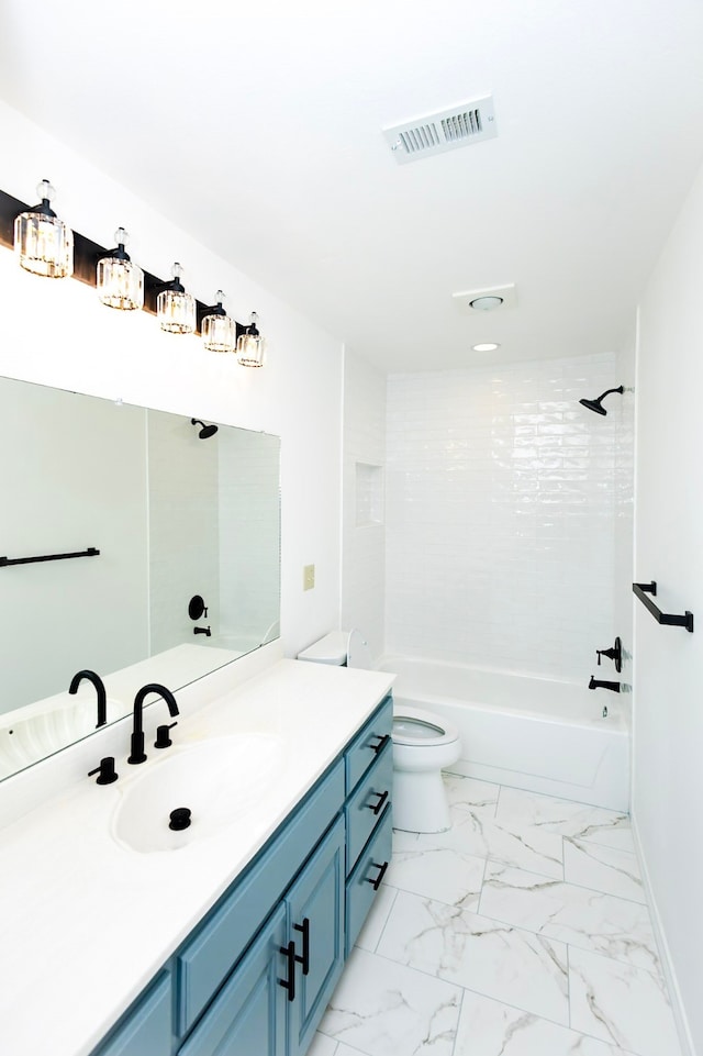 bathroom with vanity, visible vents, baseboards, marble finish floor, and tub / shower combination